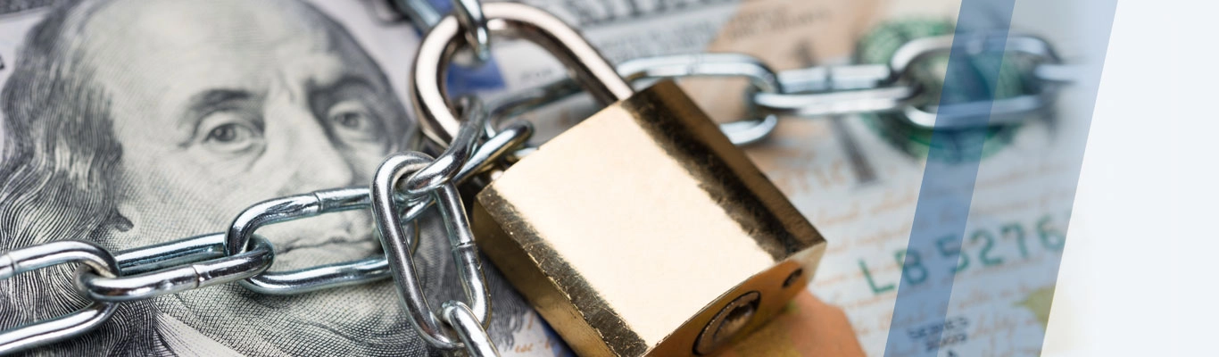 Hand holding cell phone with symbols of digital security