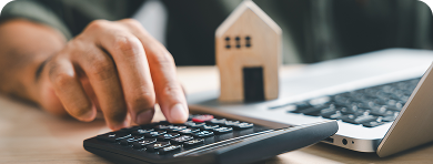 photo of family with home cardboard lifted above